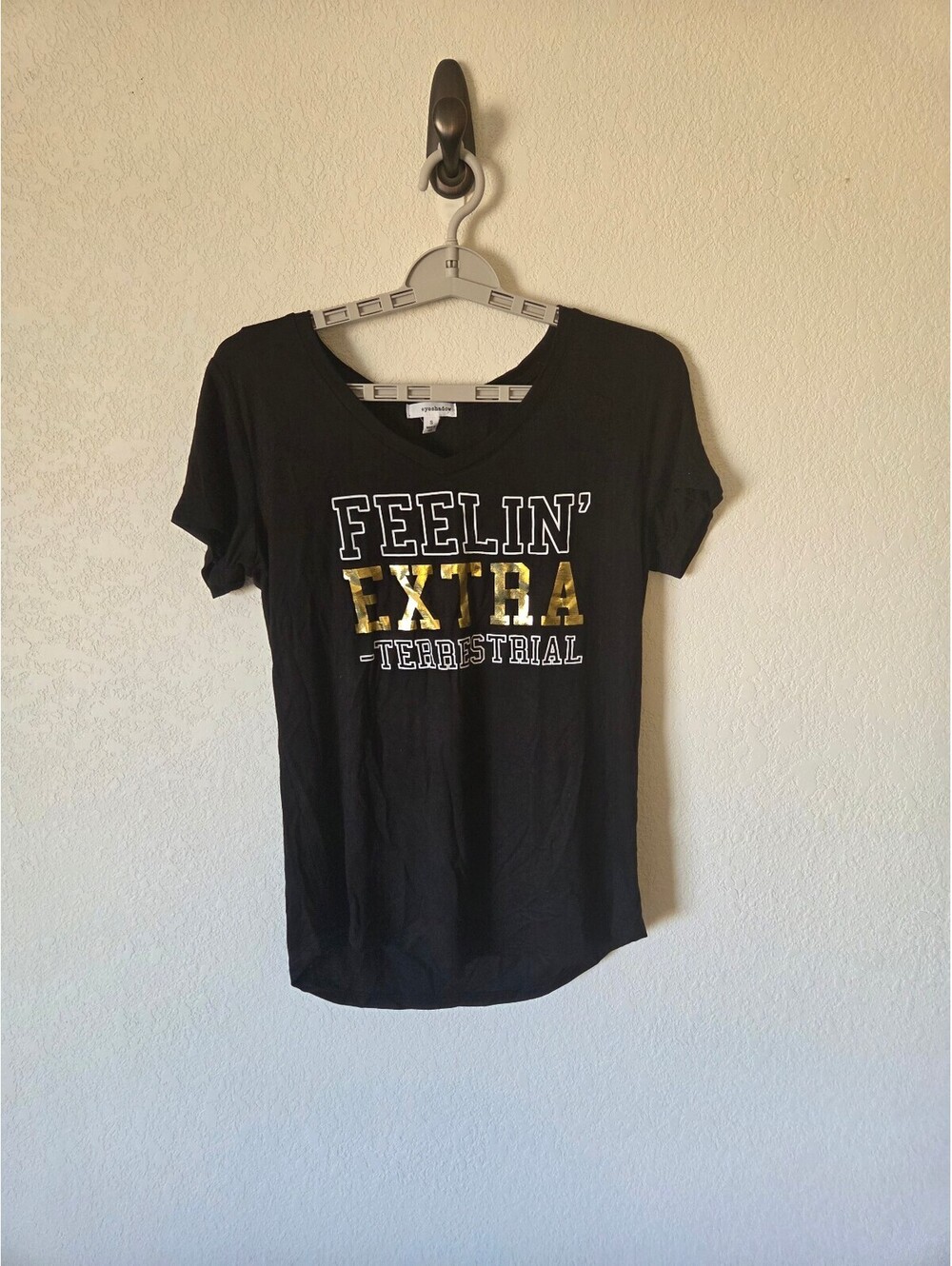 eyeshadow Black T-Shirt with 'Feelin' Extra - Terrestrial' Gold and White Print